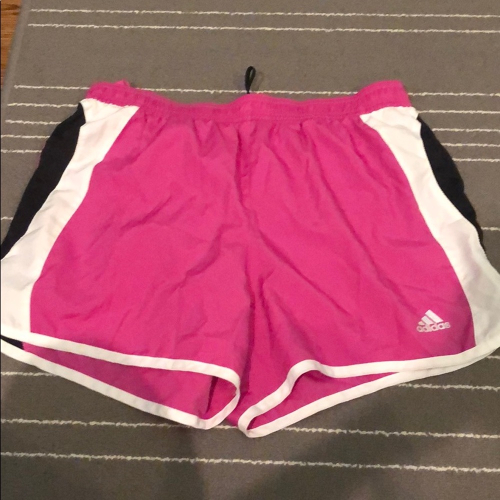 Pink,black, and white adidas shorts